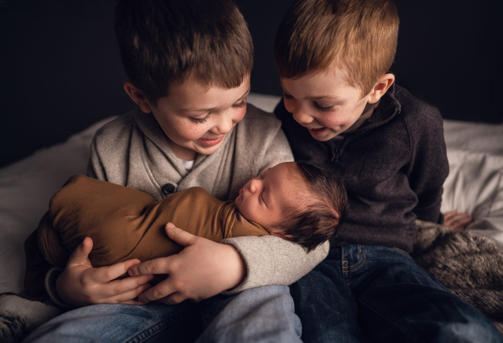 In home newborn session with brothers